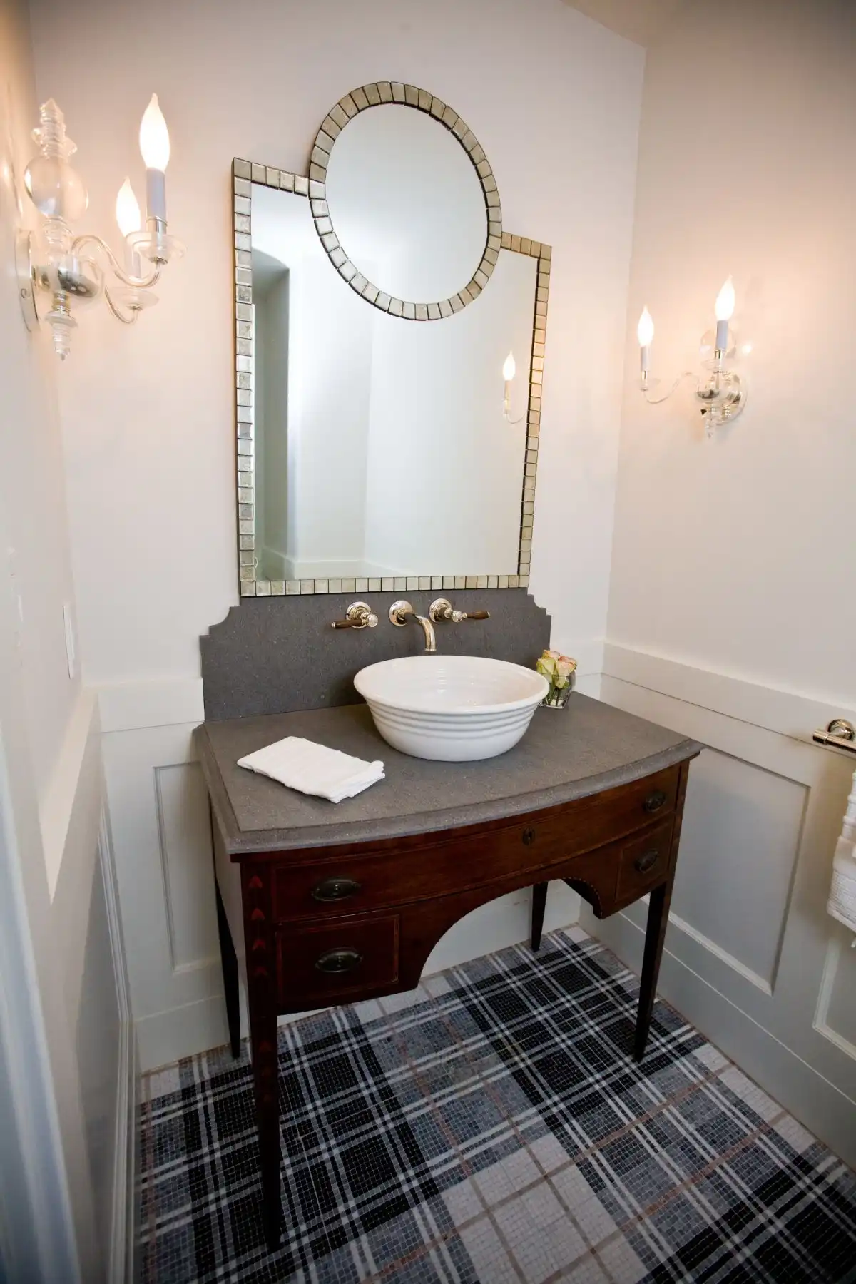 Powder room with mosaic floor tiles