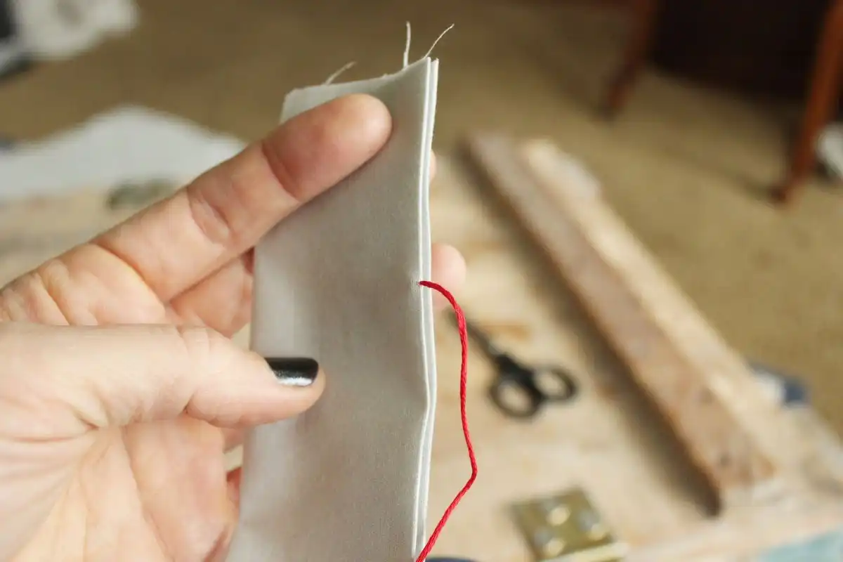 Press the tip of your needle onto the underside