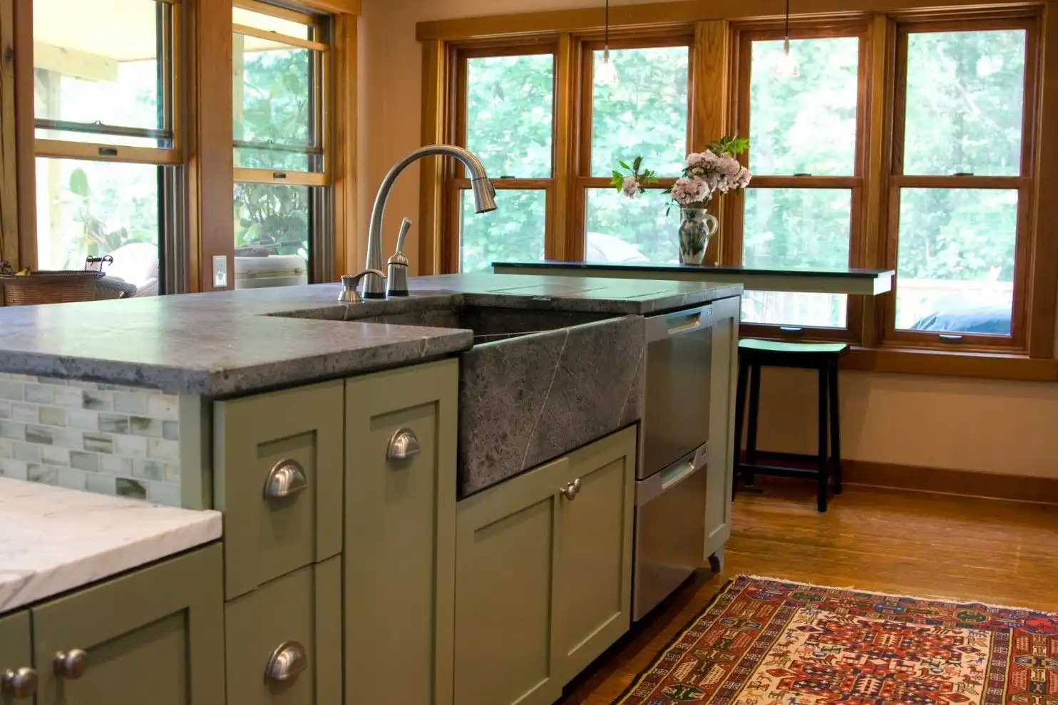 Soapstone countertops can be installed with a matching sink, like this design by Quality Stone Concepts.