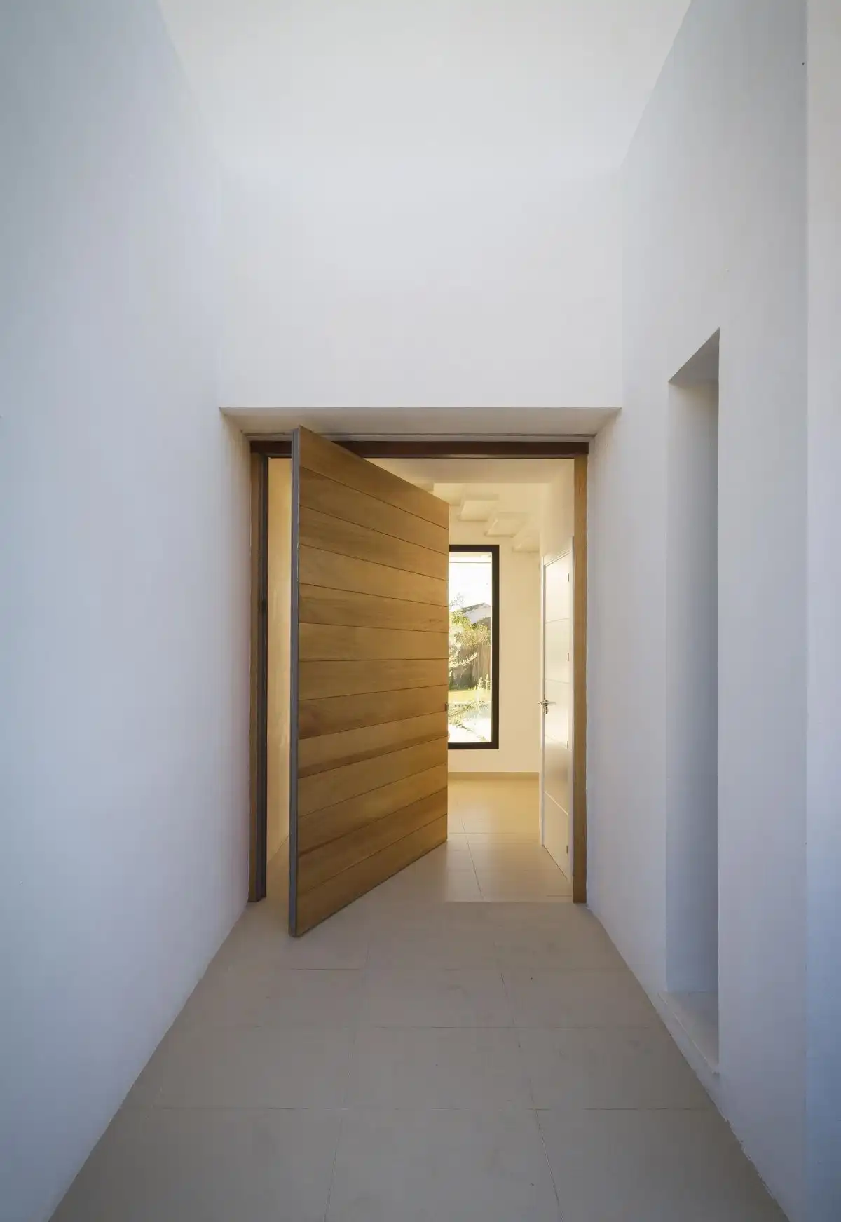Ramos residence wood entry door