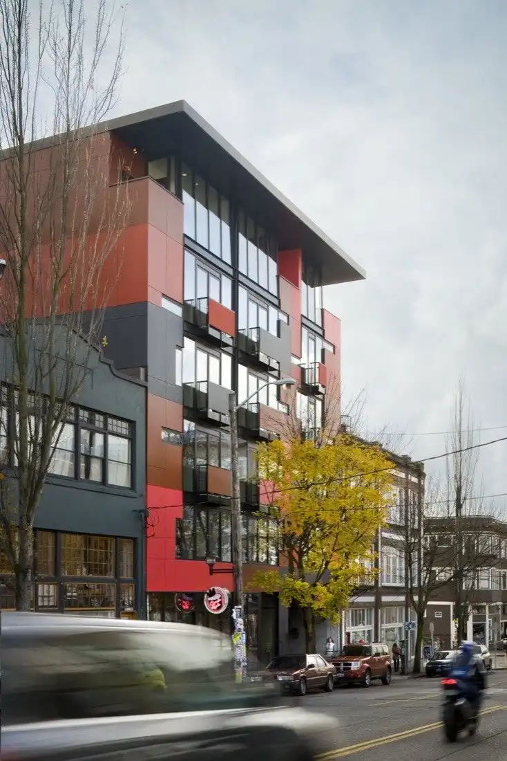 Red facade 1111 E Pike by Olson Kundig Architects