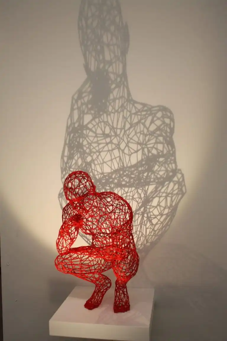 Red version of The Thinker