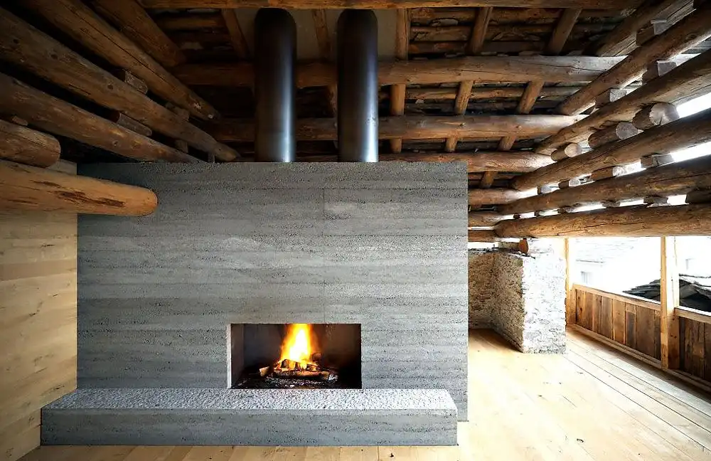 Redevelopment of a Barn in Soglio Fireplace