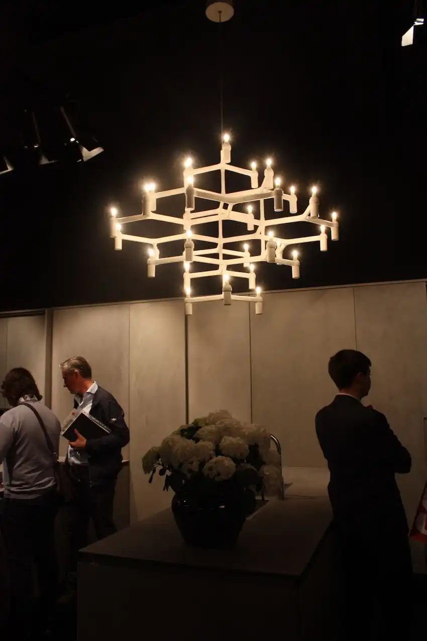 Rifra's large chandelier is a dramatic kitchen lighting option. While it may have a traditional chandelier shape, the design is decidedly modern.