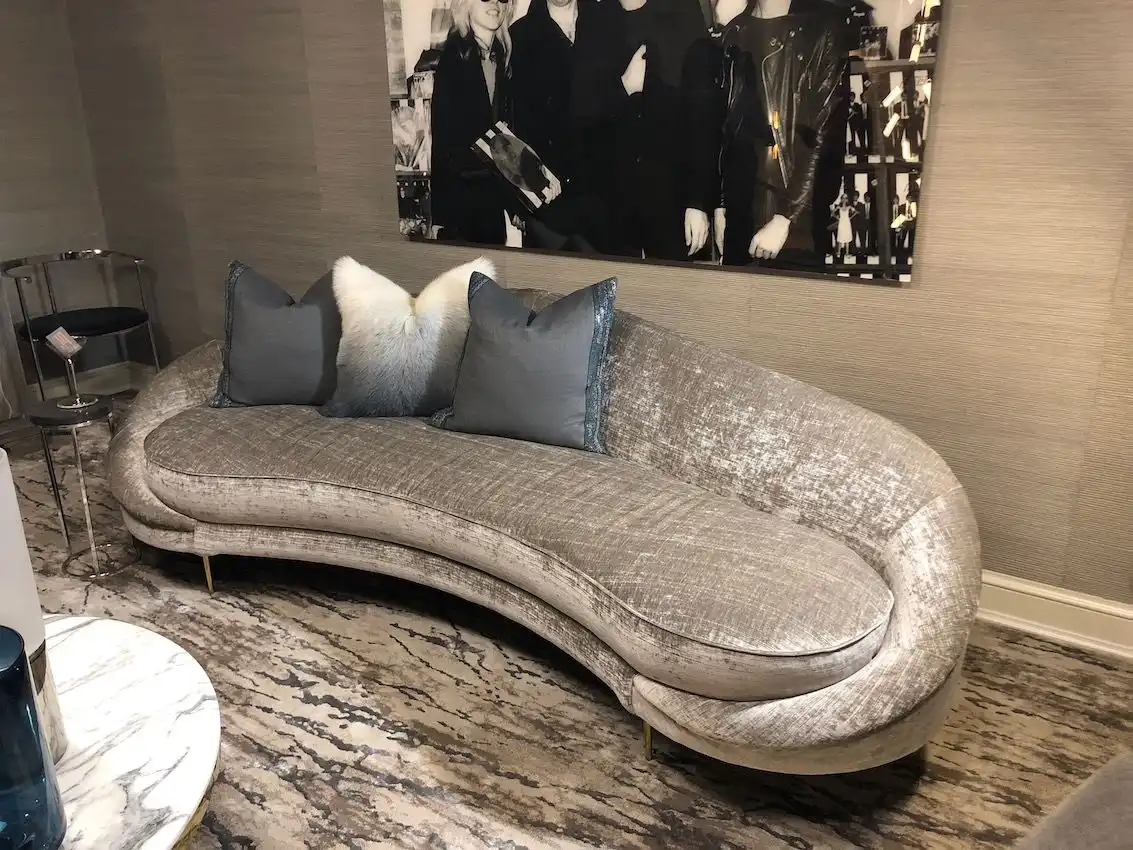 This silvery sofa is the stylish focal point of the lounge.