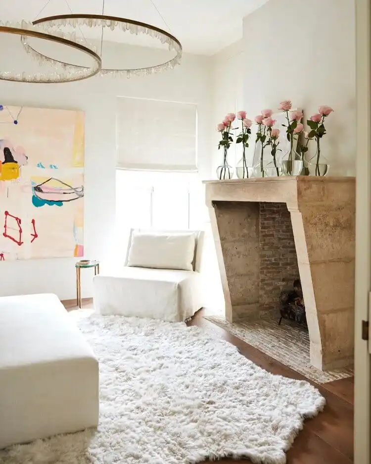 Room with fireplace and pink roses