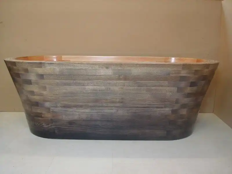 The Rosemarie wooden bathtub by Wooden Baths Ltd in Scotland is coated with a High Clarity glass reinforced epoxy resin. This coating is incredibly hard wearing. The glass fabric reinforcing makes the bath extremely resistant to changes in humidity, temperature and high UV levels.