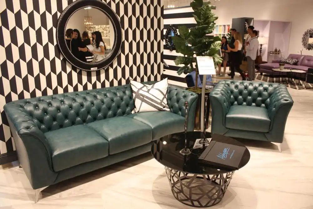 Round mirror above the sofa