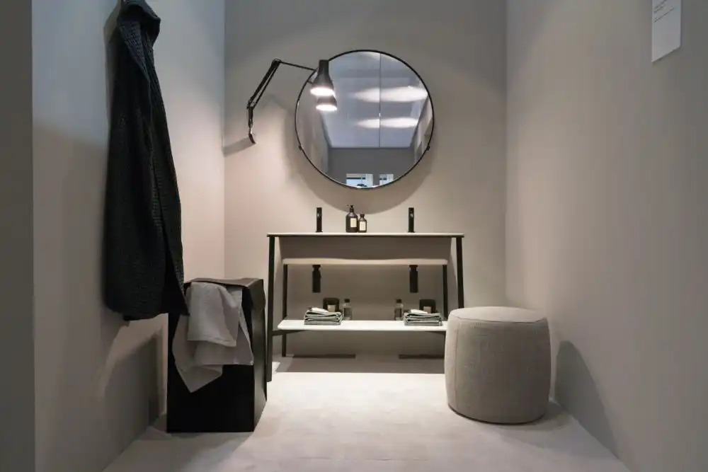 Round mirror bathroom in gray space