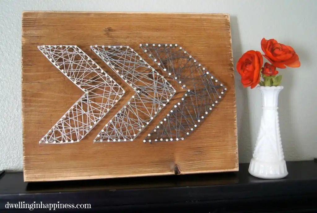 Rustic arrow string art