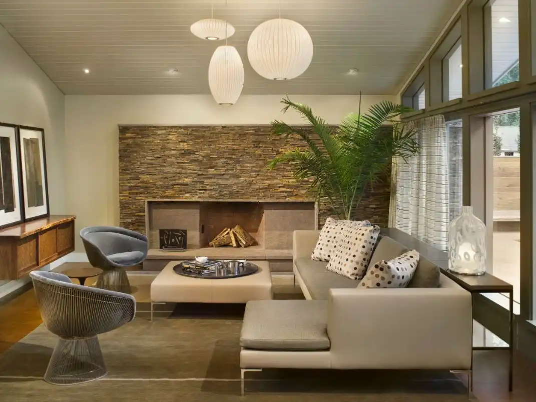 Rustic fireplace tile and modern armchaird