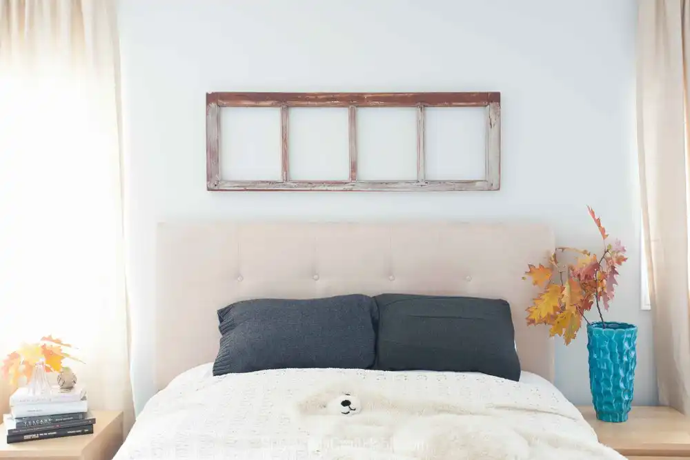 Rustic frame above the bed