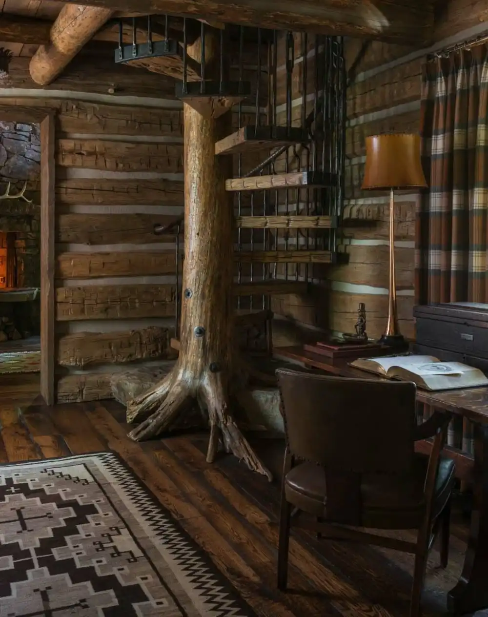 Rustic mountain residence in in Teton Valley Wyoming spiral staircase