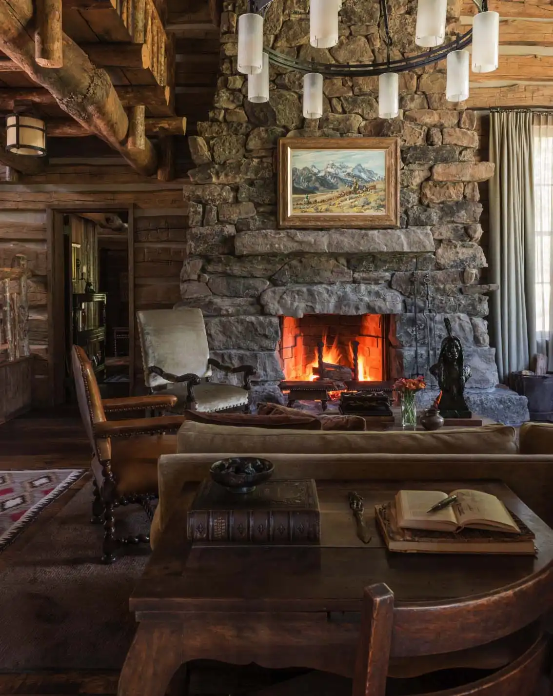 A massive fireplace is a very enticing feature of the living room.
