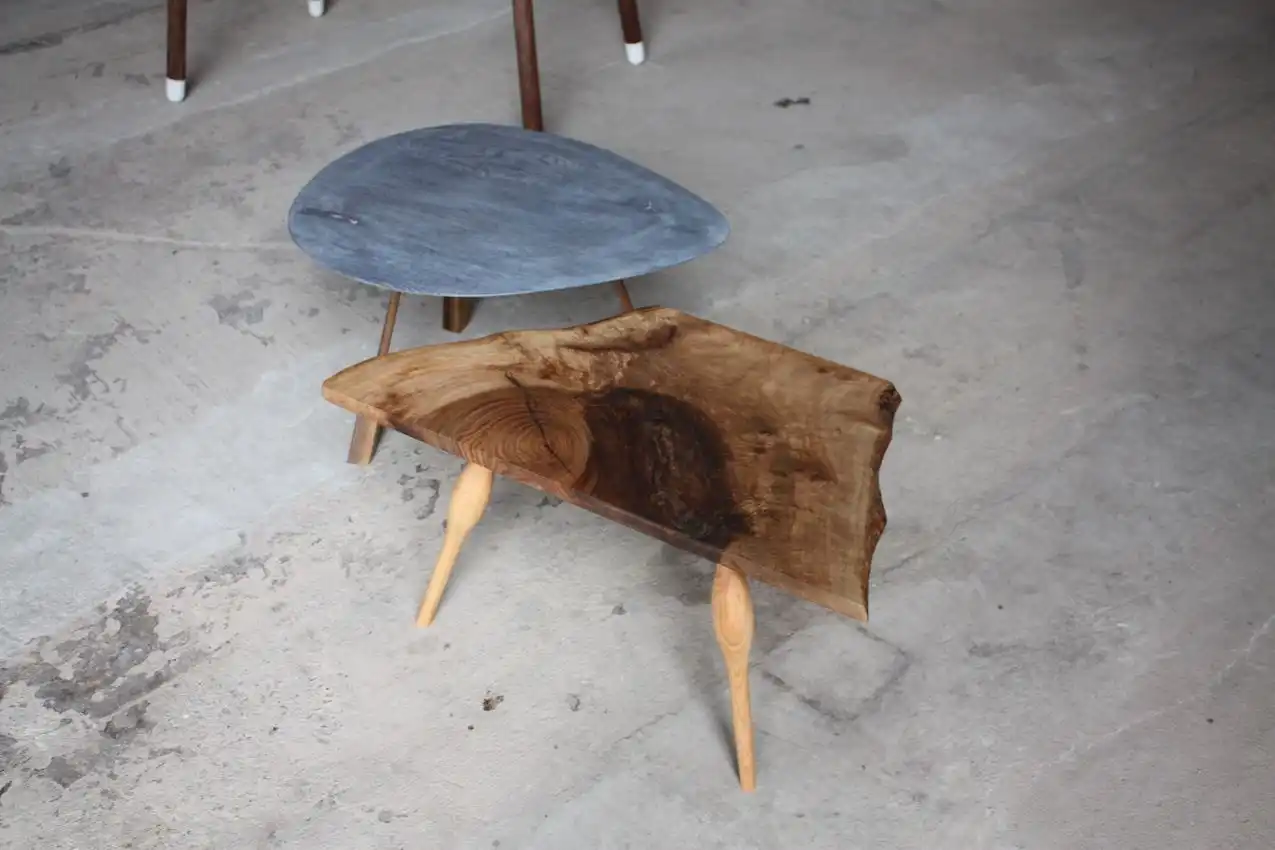 Live edges and handcrafted designs distinguish these pieces.