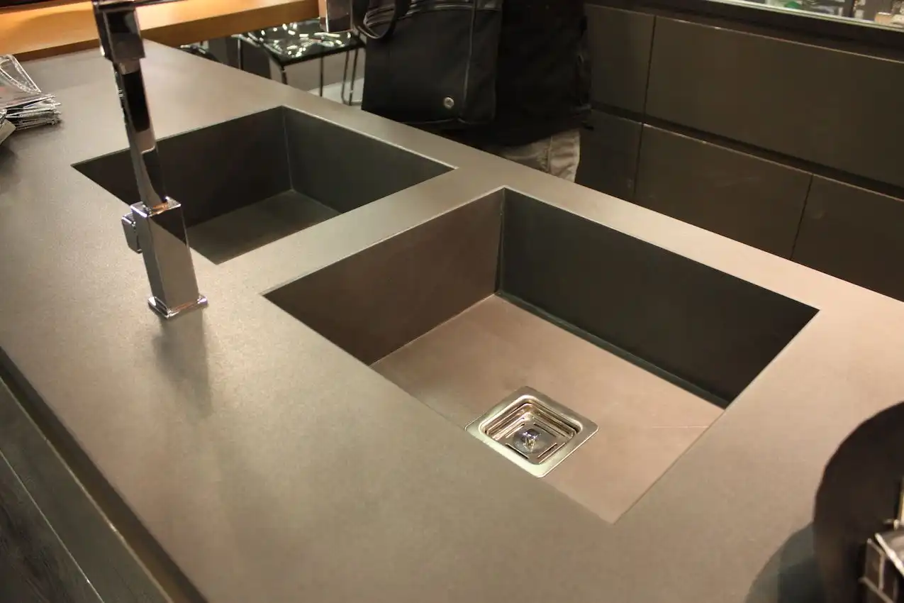 New materials and integrated sinks easily update a kitchen space.