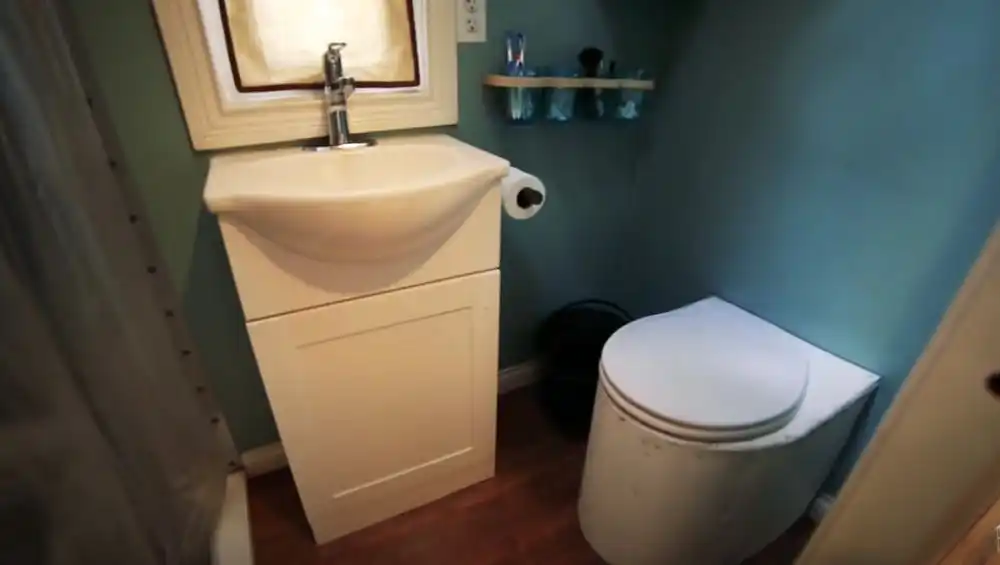 School Bus Converted To Incredible Off Grid Home bathroom