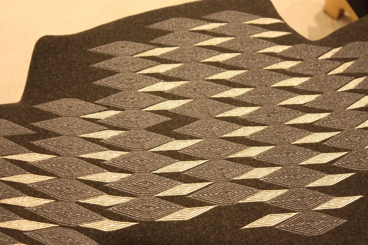 A close-up of the beaded upholstery top.
