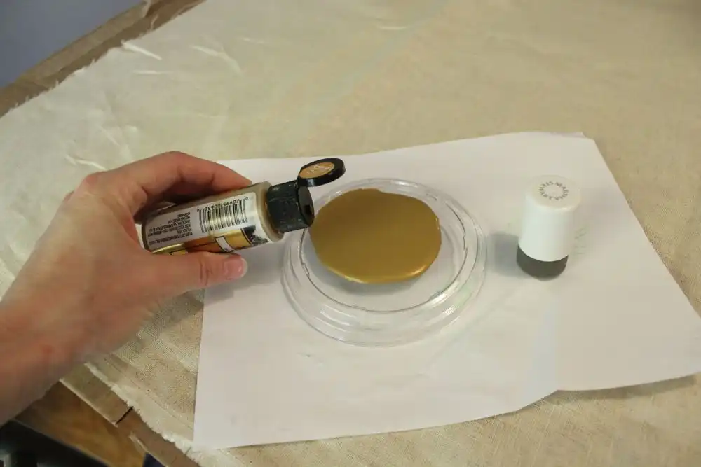 Shake up your acrylic paint bottle