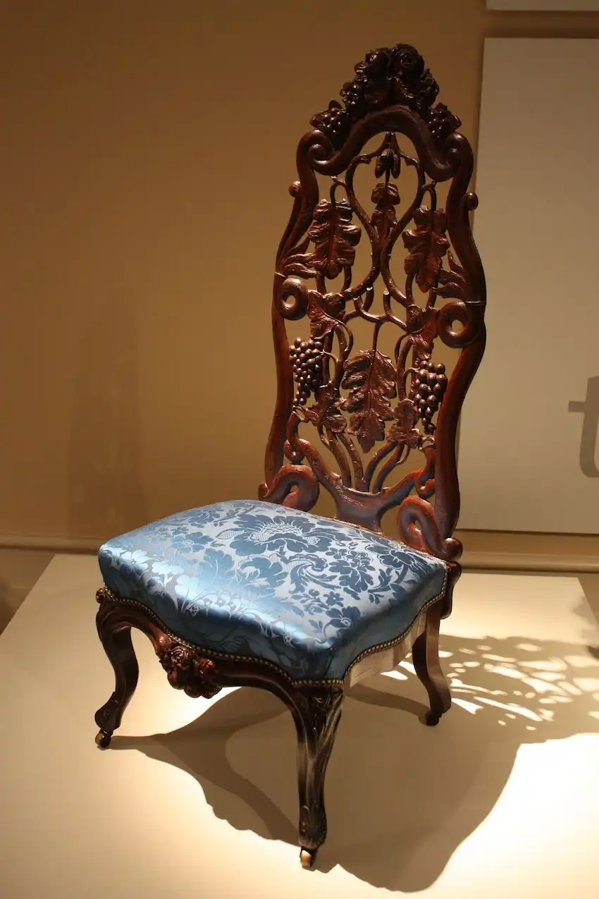 Low with a long back, slipper chairs are a classic shape.