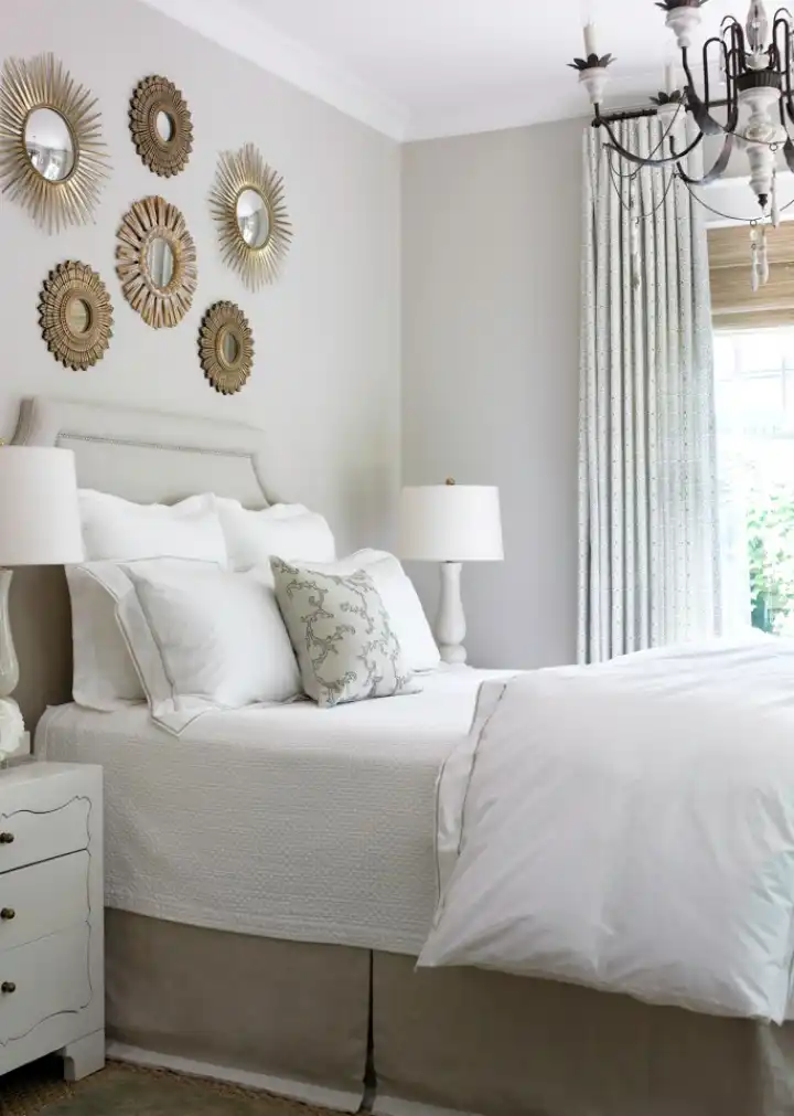 Small Sunbursts mirrors above the bed