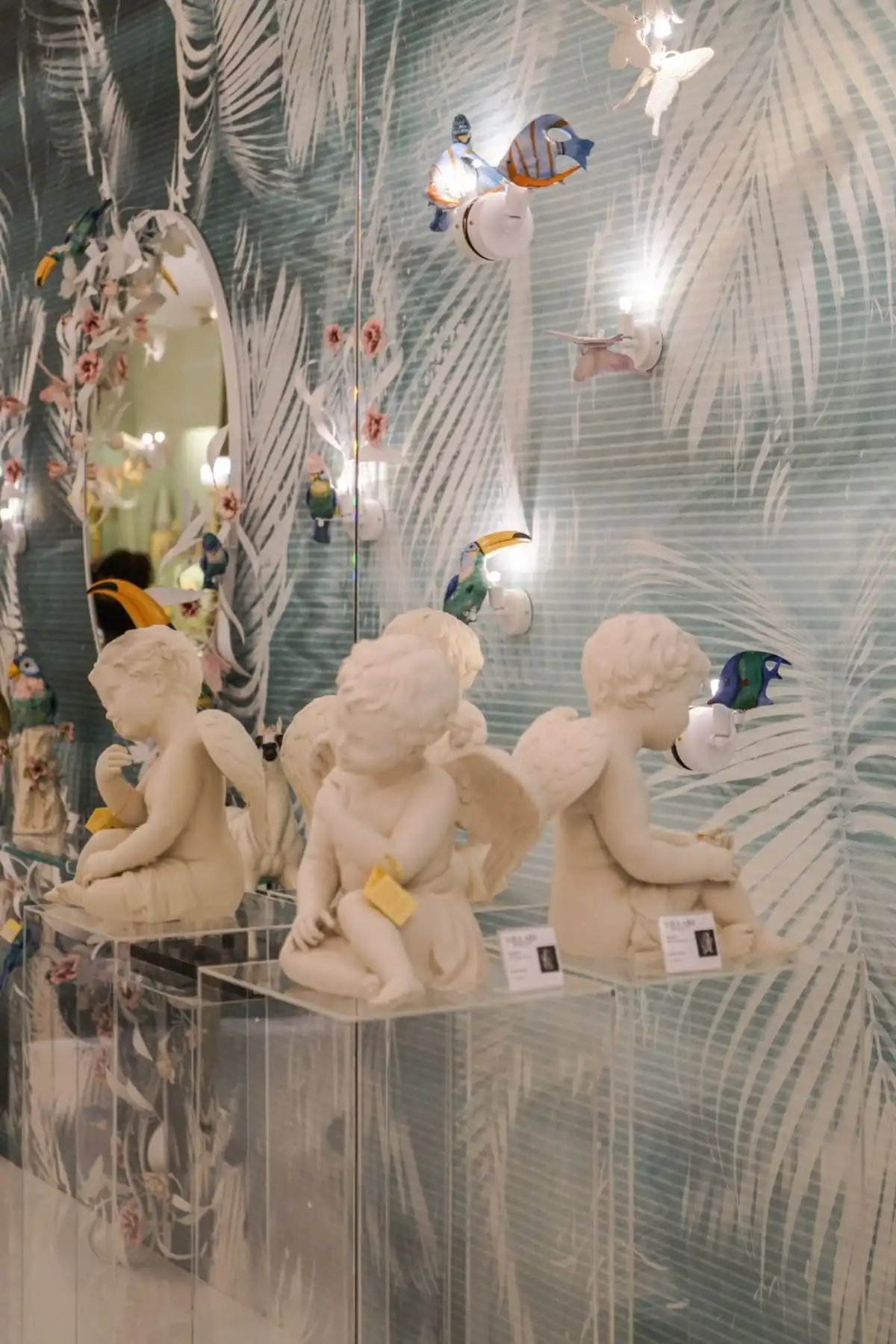 Small cherub sculptures