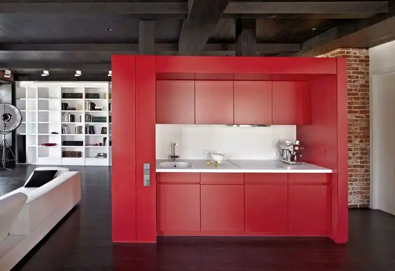 Small minimalist red kitchen Apartment Renovation in Moscow by Studioplan
