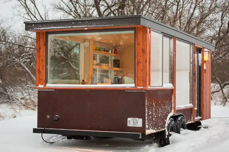 Small tiny home on wheels back