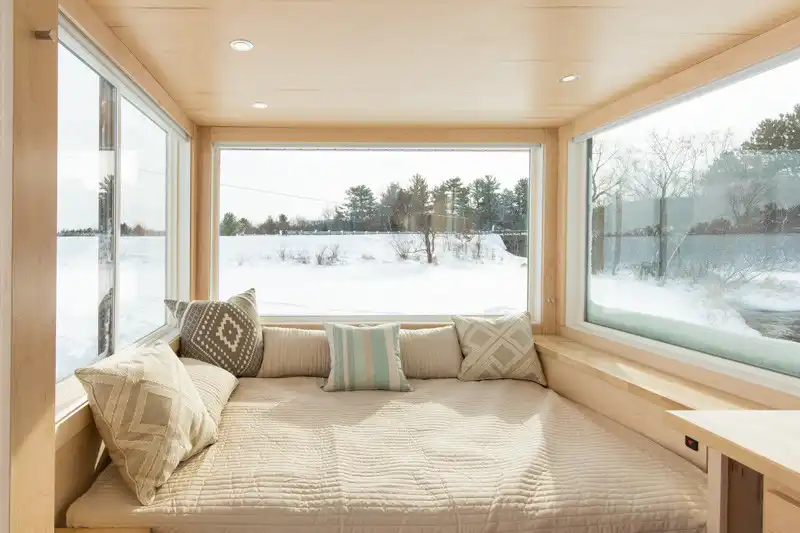 Small tiny home on wheels bed