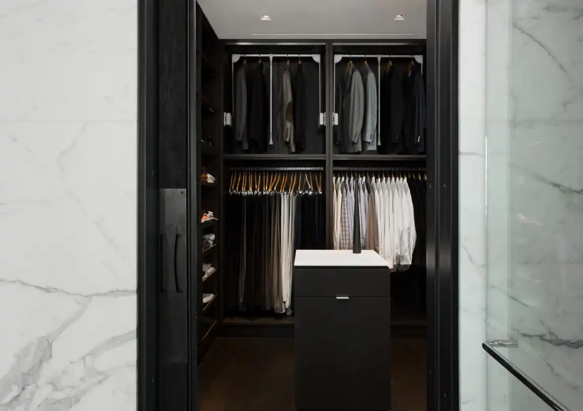Small walk in closet entrance walls with marble