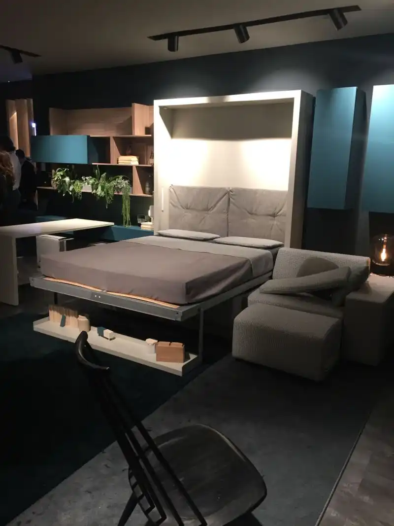 Space saving bed storage on wall