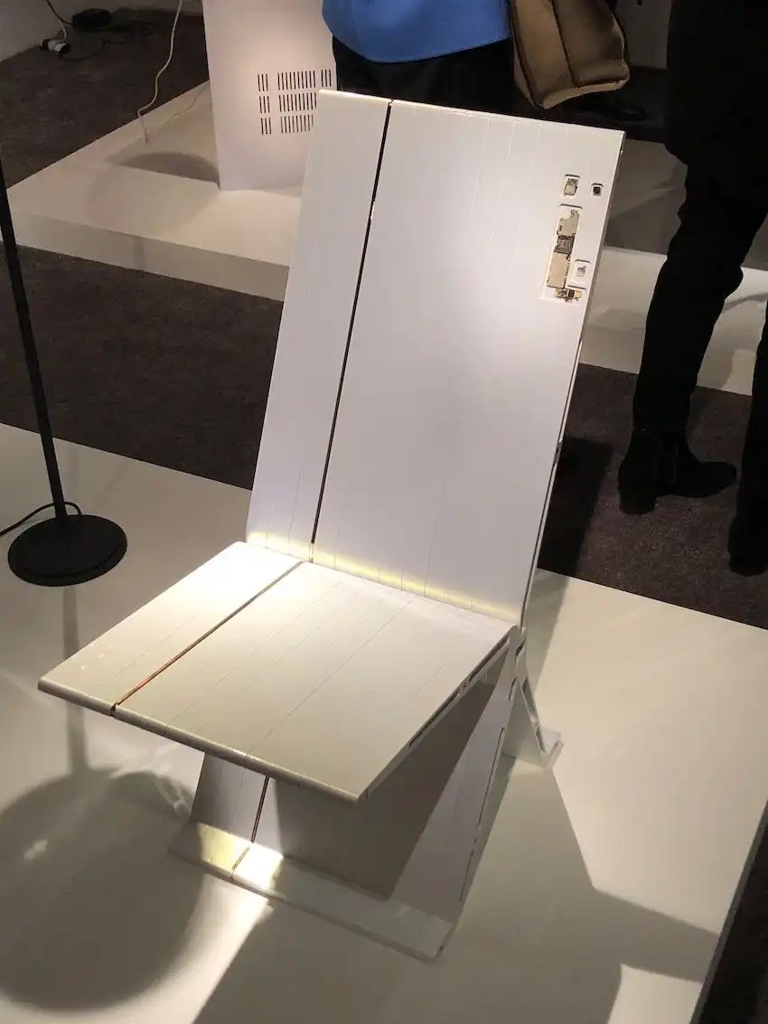 Angular and modern, this chair uses parts from old cell phones.