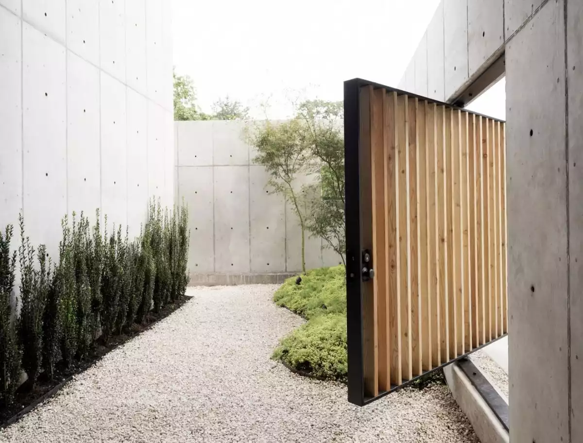 Steel and wood pivot front door