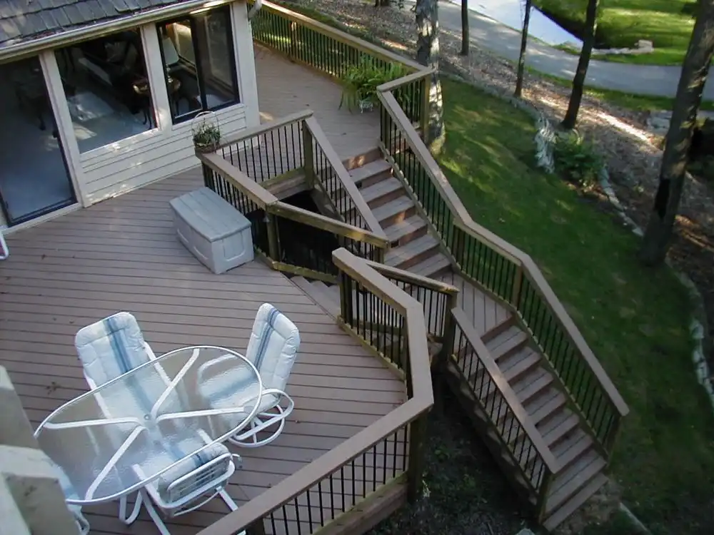 A central landing breaks up a long expanse of stairs.