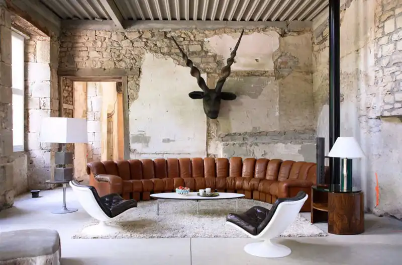 Striking constrast for living room - curved brown leather sofa