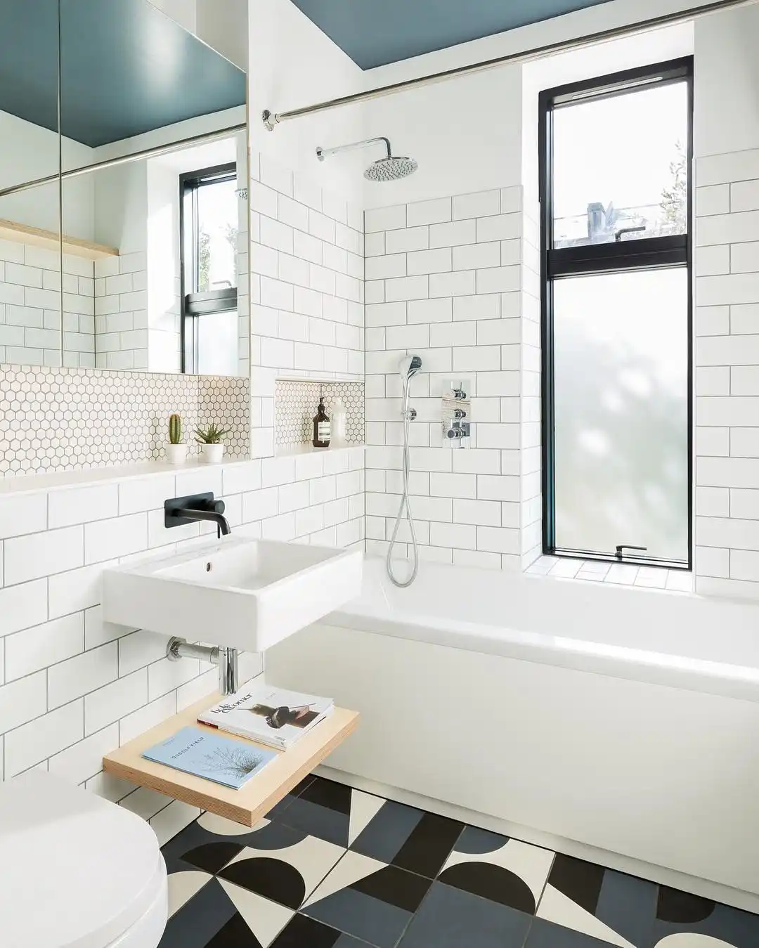 Subway white tiles and patchwork for floor