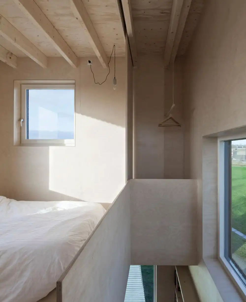 Tall and small micro house by architect Ana Rocha - bedroom