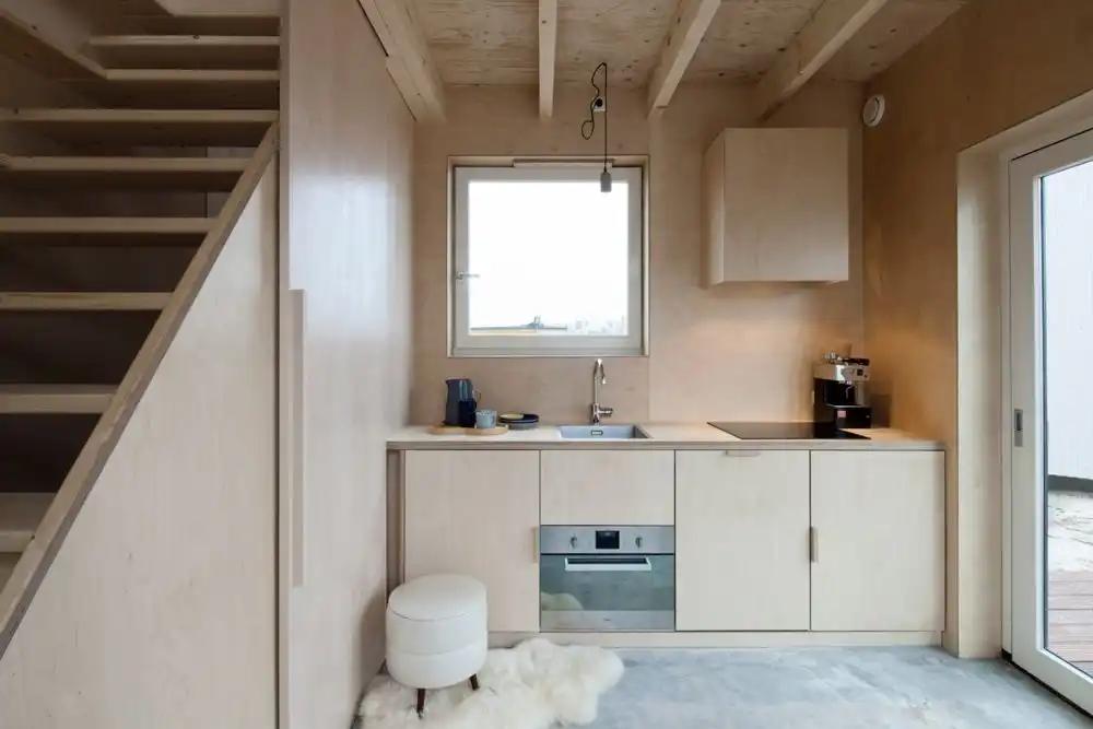 Tall and small micro house by architect Ana Rocha - kitchen