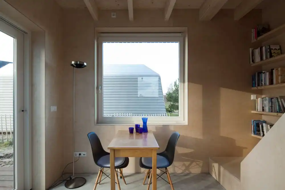 Tall and small micro house by architect Ana Rocha - living area