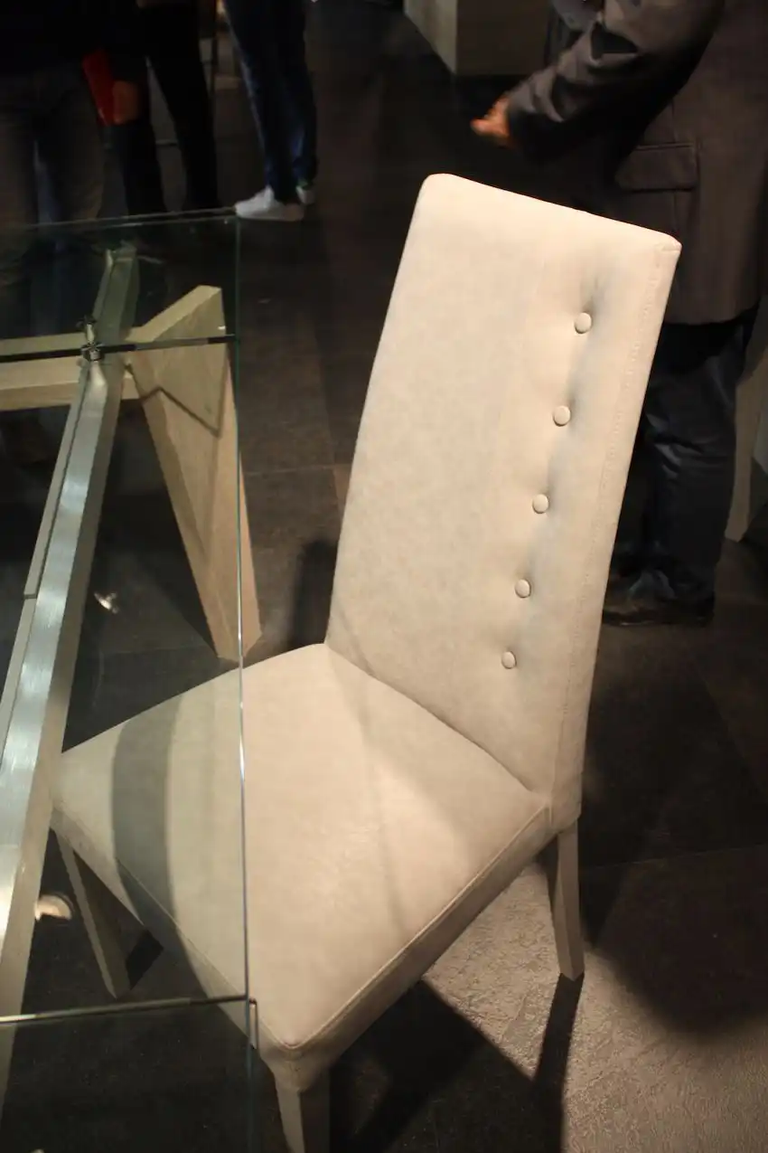 Tall-backed, fully upholstered chairs are very popular for dining rooms.