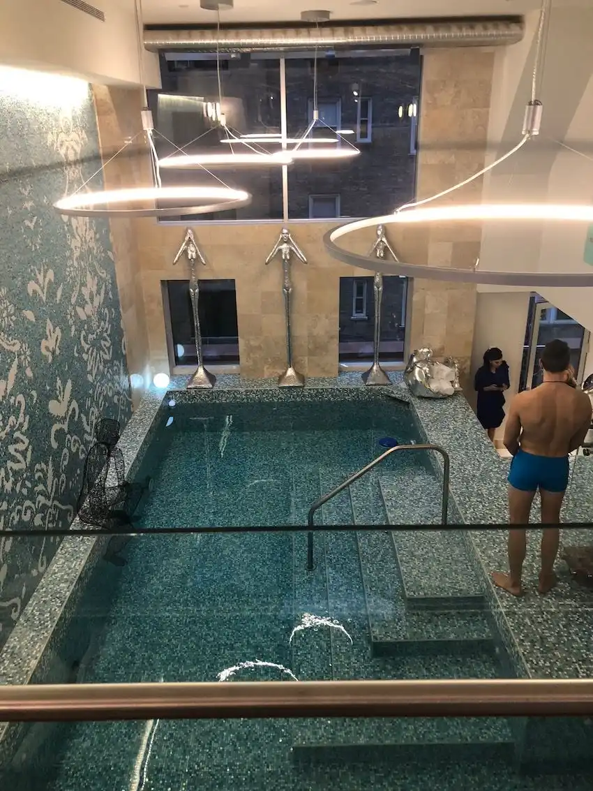 The tall ceiling in the pool area makes it feel open and light-filled.