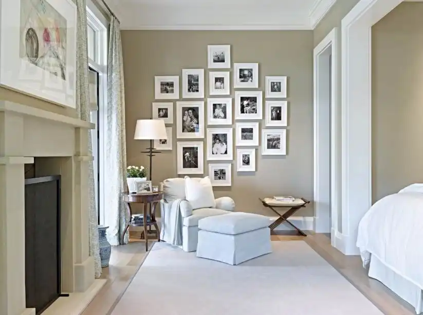 Taupe bedroom paint color and beautiful way to display family pictures