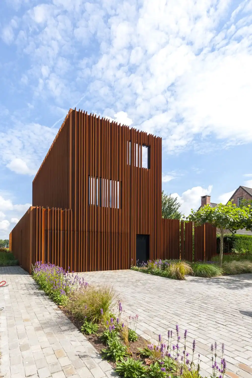 The Corten House by DMOA Architecten