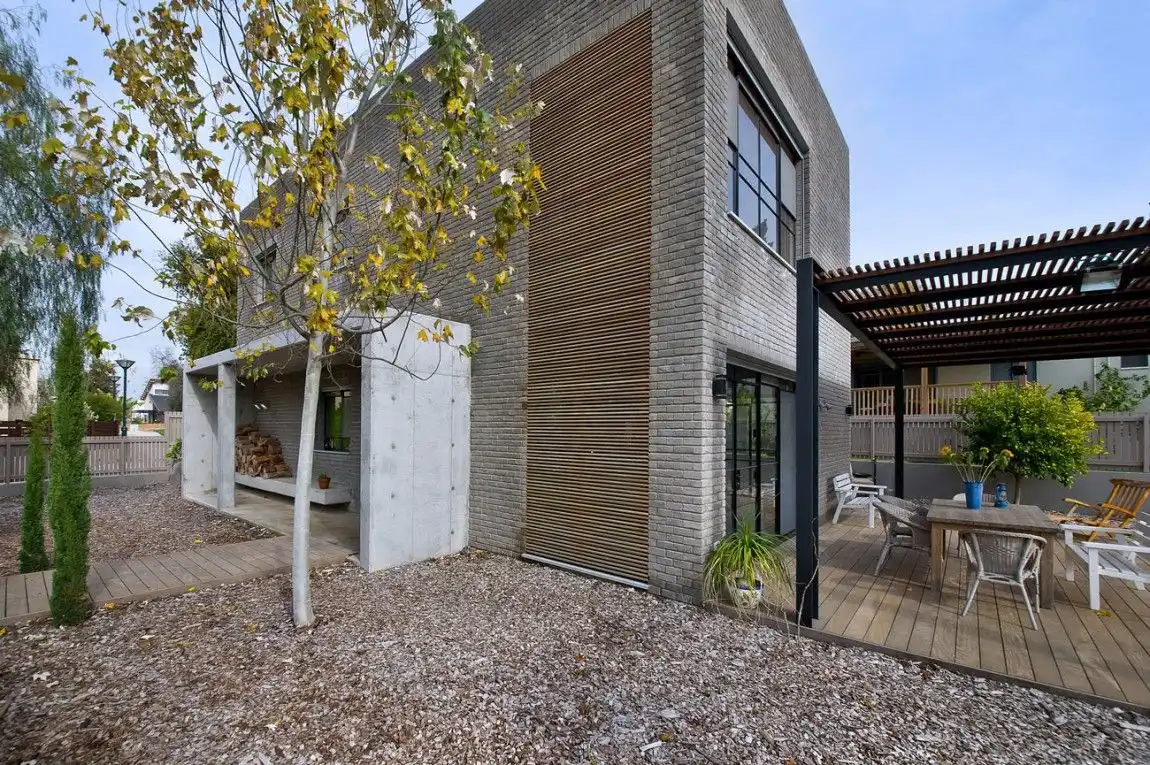 The Kibuts House by Sharon Neuman Architects with Modern Furniture on Deck Pergola
