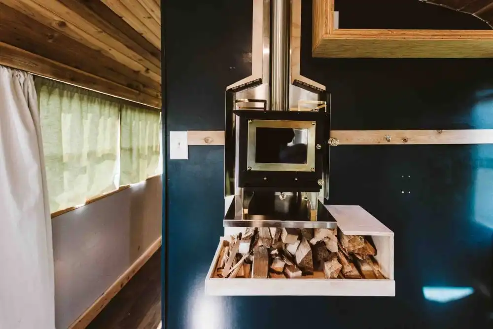 The Skoolie Romantic Urban Glamping fireplace