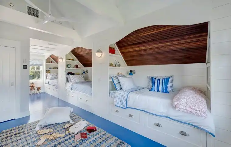 This old classic shingle-style home - bunk beds with built in spaces