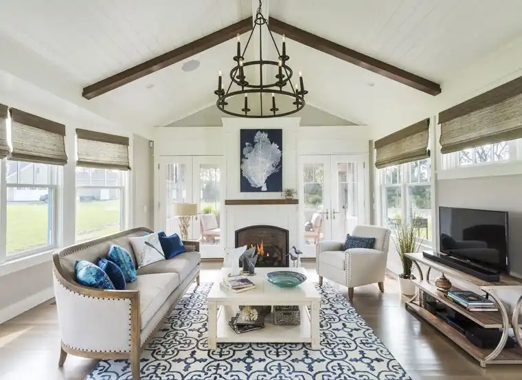 This old classic shingle-style home - decorating a living room