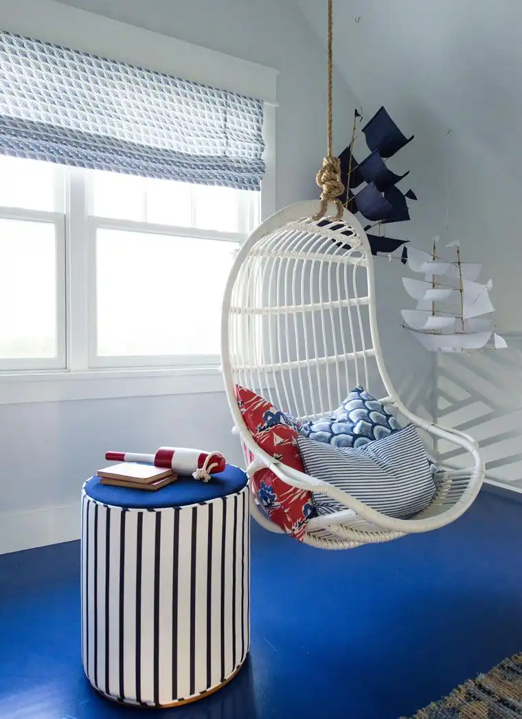 This old classic shingle-style home - hanging chairs