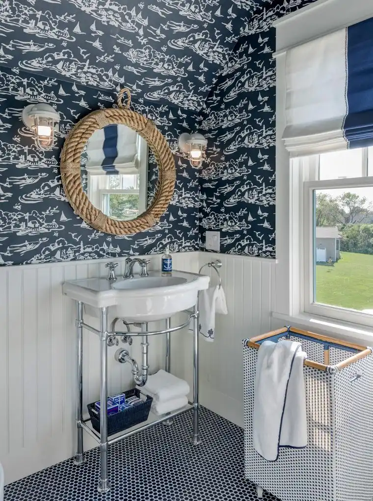 This old classic shingle-style home - powder room with coastal decor