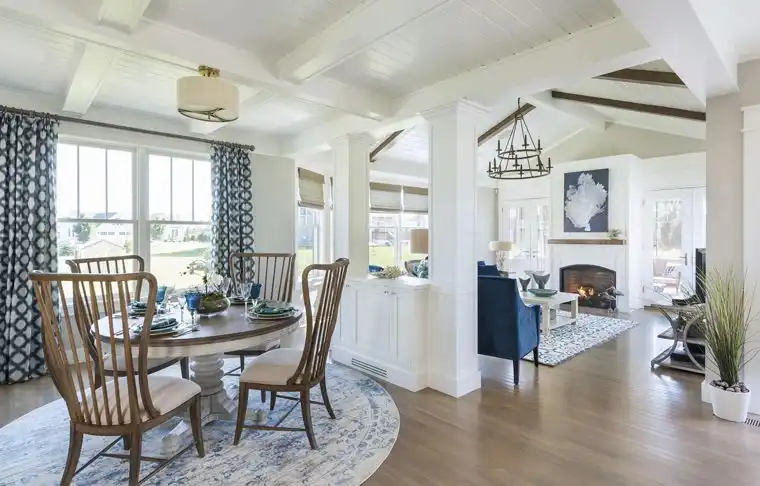 This old classic shingle-style home - small pony wall divider